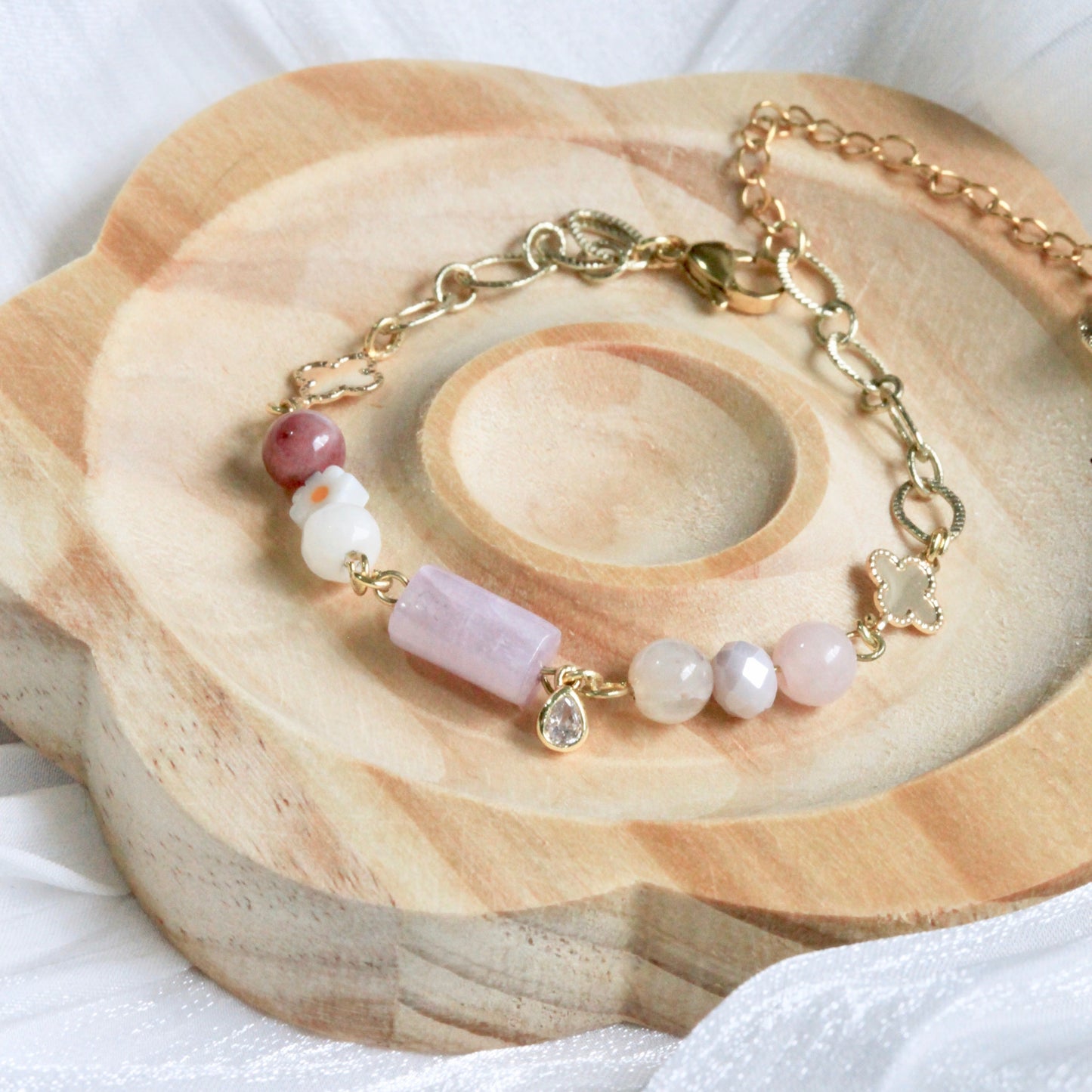 Close-up of Hushed Horizons bracelet showing pastel bead gradients, natural stones, and gold-plated accents in soft feminine tones
