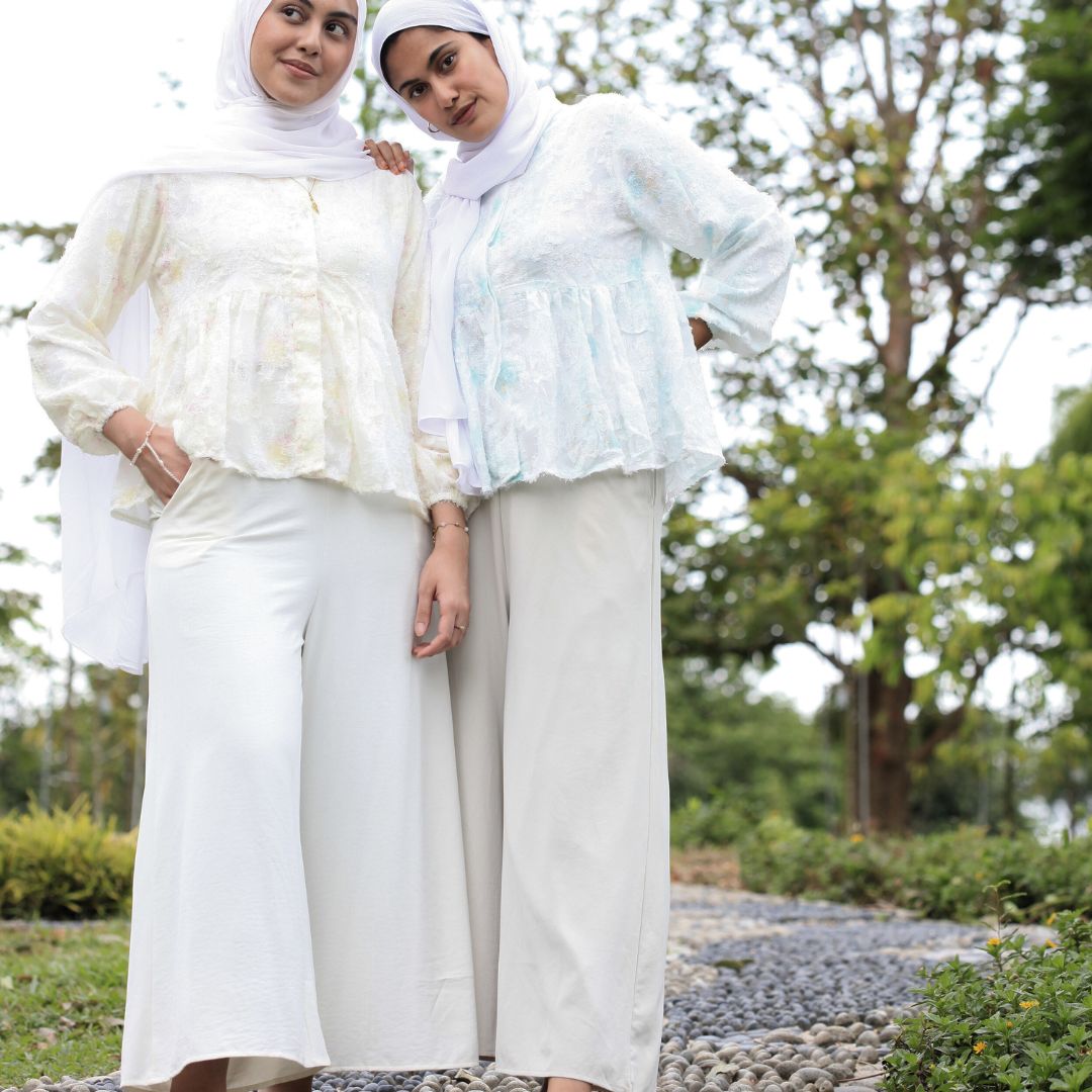 Hijabi model wearing Ariana Palazzo Pants styled modestly, featuring a flowy skirt-like silhouette and elegant wide-leg movement