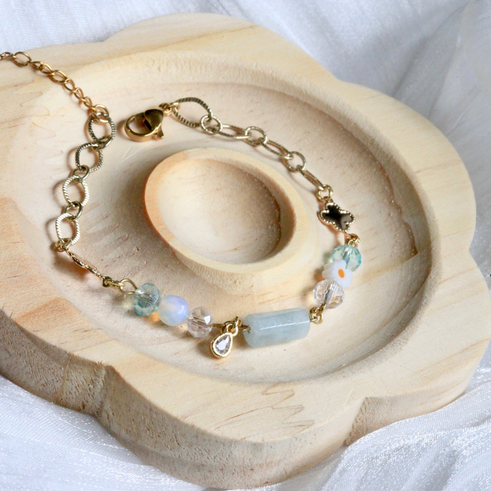 Close-up of Hushed Horizons bracelet showing pastel bead gradients, natural stones, and gold-plated accents in soft feminine tones