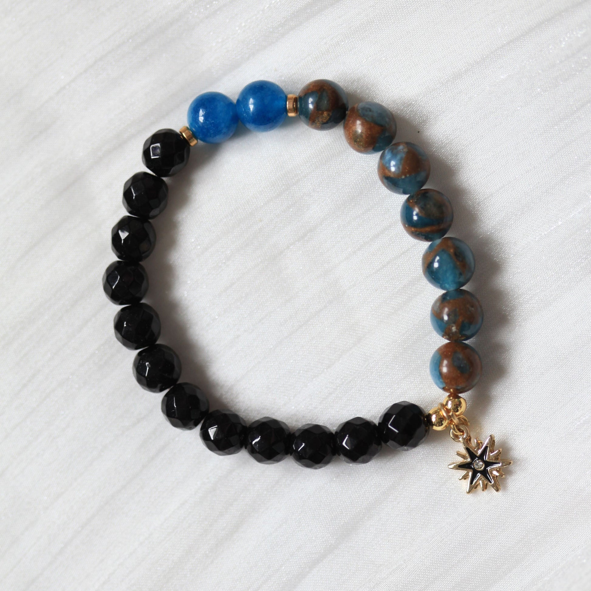 Of Muse and Daydreams beaded bracelet with soft pastel colours, inspired by dreamers and designed to encourage hope and bravery.