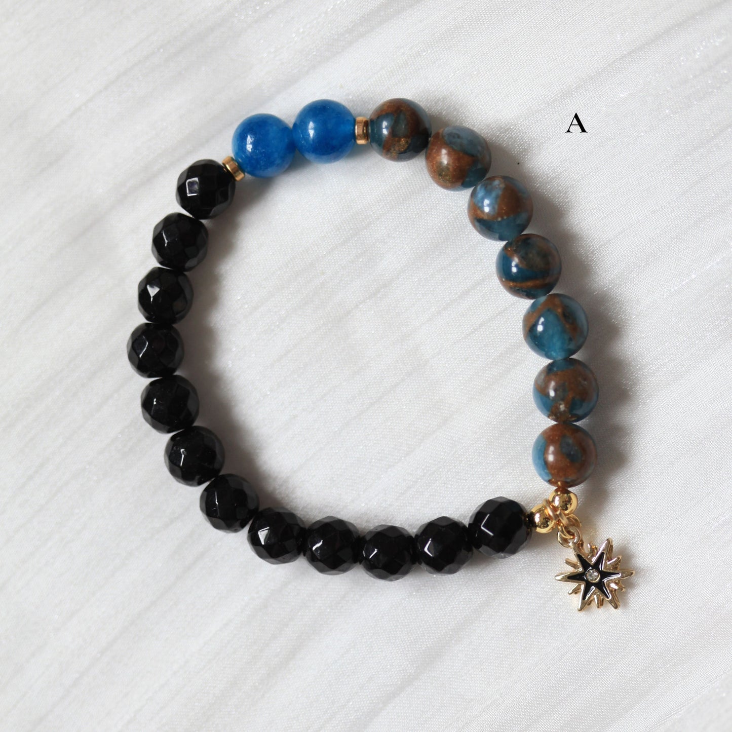 Close-up of the Of Muse and Daydreams bracelet featuring soft pastel beads and delicate colours, designed to inspire dreamers to dream big and begin bravely.