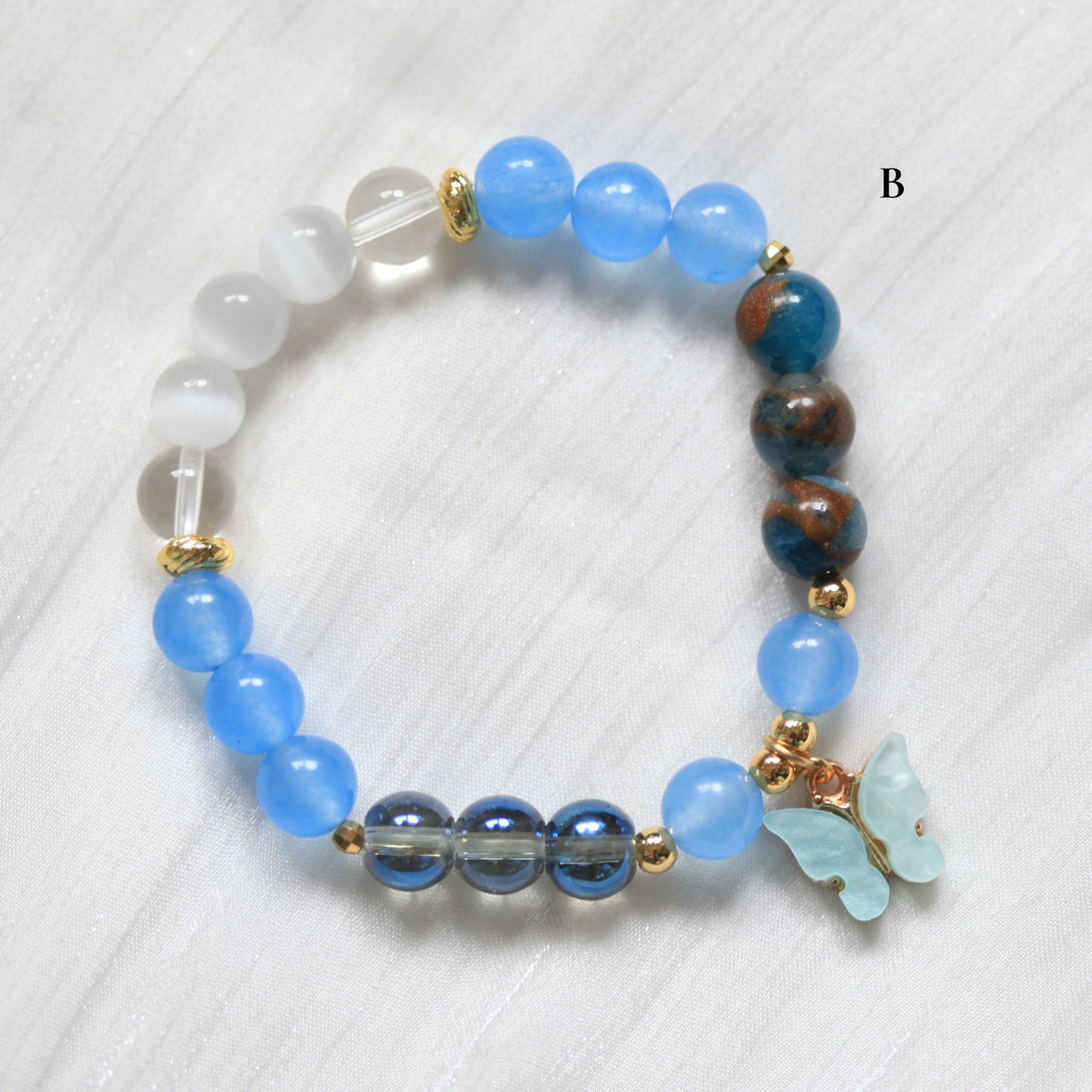Close-up of the Of Muse and Daydreams bracelet featuring soft pastel beads and delicate colours, designed to inspire dreamers to dream big and begin bravely.