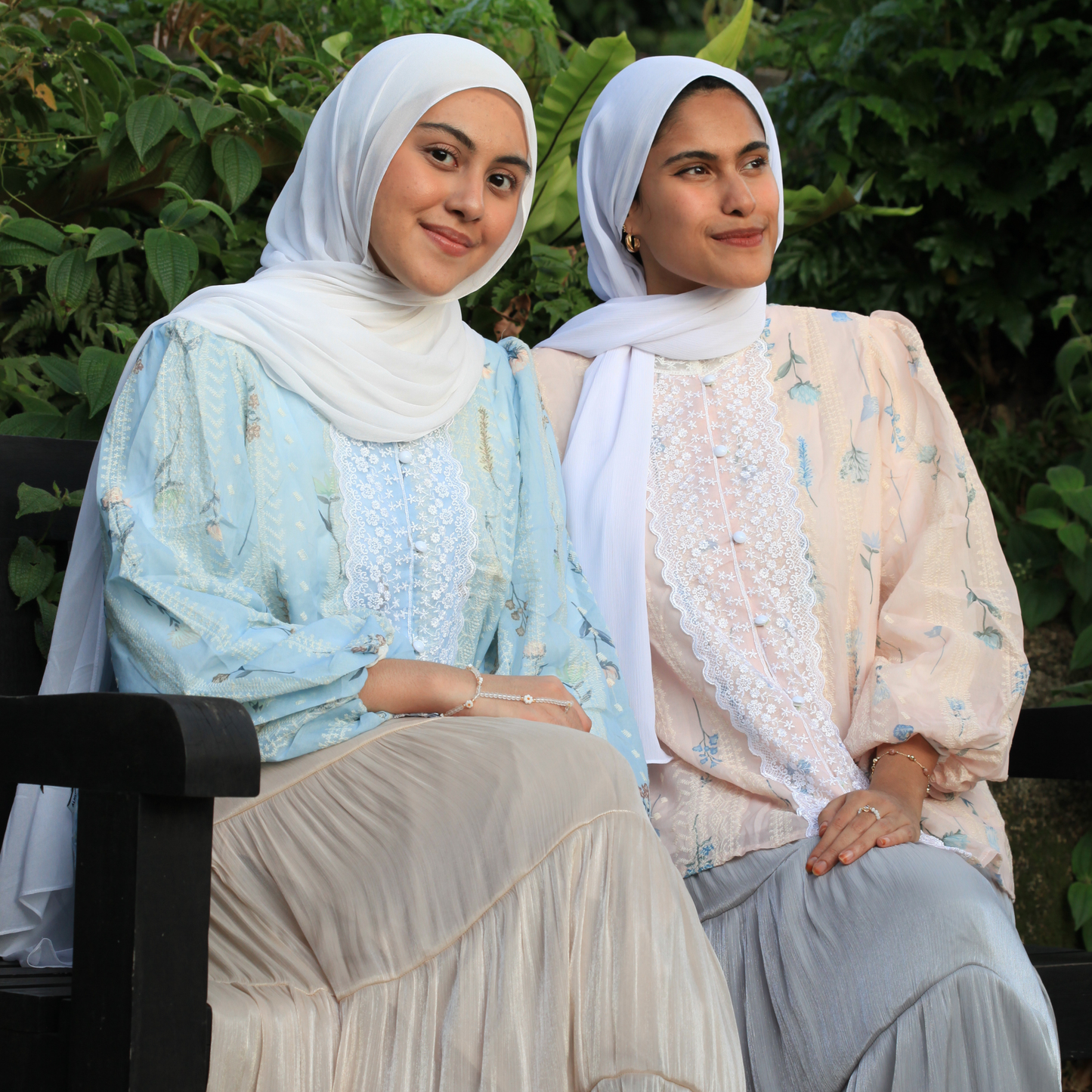 Hijabi model wearing Rosemary Verse blouse, a modest elegant top with floral textures and soft puff sleeves designed for graceful everyday and modest fashion styling