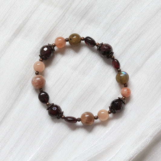 Vintage Aura Bracelet with deep red and earthy brown tones inspired by vintage aesthetics, symbolising calm, wisdom, and reflection. Made by Dreamers' Side